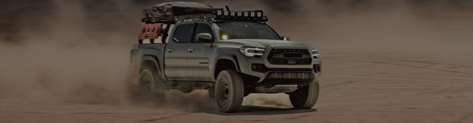 Pickup truck driving in the desert