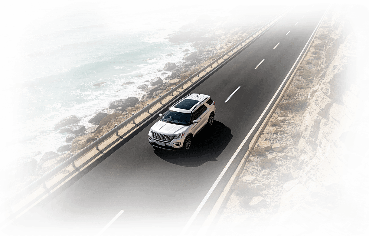 Vehicle driving along a coastal road